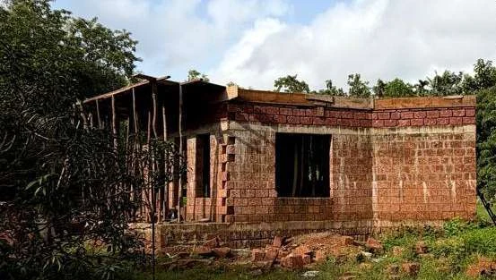The actual HONTARA ground floor under construction, surrounded by trees