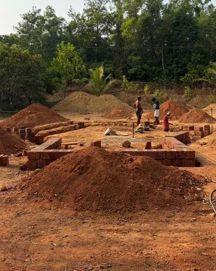 Excavated ground and early foundation work